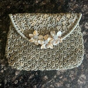 Tommy Bahama Fold Over Straw Clutch with Shell floral detail